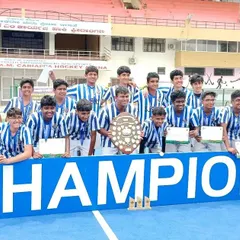 The moment of victory for the SJBHS U-17 team. Holding the Centenary Shield high, these champions represent the culmination of months of dedicated practice and teamwork.