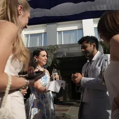 Engaging with guests at the Indore wedding. I love the freedom of walk-around magic, where I can test new ideas and create unique moments for small groups.