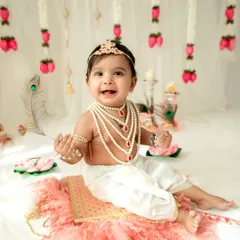 A beautiful little Radha with a peacock feather. The details in my themed sessions, from the outfits to the props, are carefully chosen to create an authentic and magical feel.