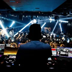My point of view from the console at Millers, Pune. A sea of faces, lights, and hands in the air.