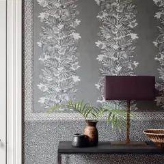 Inspired by Africa’s iconic Acacia tree, this wallpaper captures the lively spirit of mischievous monkeys in a bold, conversational design. The wide stripe effect makes it subtle yet dramatic, bringing charm to any space.