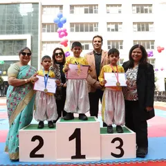 We celebrate every achievement, big and small. Here, our young champions stand proudly on the winners' podium with their parents and our school leaders during our Annual Sports Day, 'Khelchakra'.