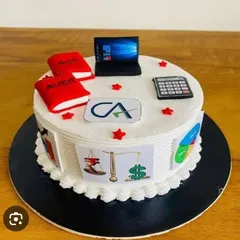 Marking the incredible achievement of becoming a Chartered Accountant. This cake is decorated with edible toppers representing the profession, including a laptop, calculator, and books for Audit and GST. The sides feature symbols of finance and justice, making it a truly customized tribute.