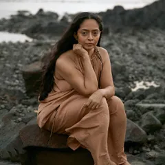 I often find the most profound portraits come from the simplest poses. This shot captures a thoughtful and grounded presence, telling a story without a single word.
