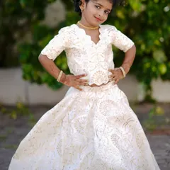 This little client looks like a princess in her custom-made lehenga. I take special care with measurements to ensure a perfect fit for growing children.