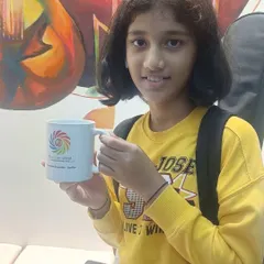 Celebrating a student's success with a small token of appreciation. It's these little moments that strengthen the bond within our Spectrum World family.