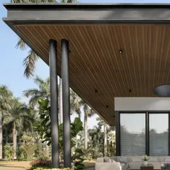 A close-up of the architectural details. The sharp lines of the steel frame contrast with the warmth of the timber-slatted ceiling, while the slender columns allow for an unobstructed view of the palm trees and garden.