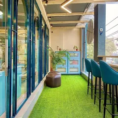 The studio balcony offers a place to catch your breath and enjoy a view of the neighborhood. It is a little pocket of fresh air and calm.