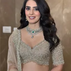 Embracing the elegance of subtle glam for this perfect engagement bride. The soft curls and natural-looking makeup enhance her features beautifully, creating a timeless and sophisticated look.