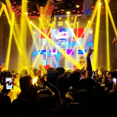 My happy place isn't a beach; it's right here, behind the decks at Sugar Factory, looking out at a sea of people with their hands in the air, completely lost in the music.