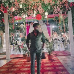 Another shot from a wedding event, standing under a beautifully decorated mandap. I'm always inspired by the creativity of wedding decor.