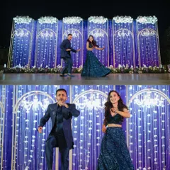 The couple's high-energy dance performance on a beautifully lit stage. We love capturing the fun and coordination of Sangeet night choreography.
