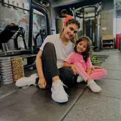A quiet moment with my workout partner after a session. Making fitness a family affair creates lasting healthy habits.