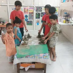 Proud moment! The young artists gather to show off the Ganesha idols they sculpted. It’s a wonderful feeling to see them stand by their collective achievement.