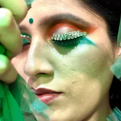 A close-up of my conceptual Independence Day makeup. This shot highlights the detailed application of crystal embellishments along the lash line, set against a tricolor blend of eyeshadow. It demonstrates my ability to execute artistic and thematic concepts with precision.