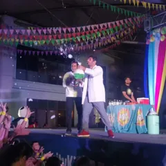 The fun spills off the stage and into the audience! Here, our professor launches safe, smoke-filled bubbles into the crowd, creating an immersive experience where everyone feels like part of the experiment.