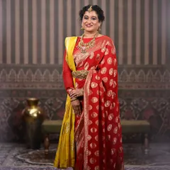 A full-length shot that captures the royal essence of this look. It is a perfect example of how to style for a grand, traditional theme.