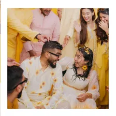 A candid moment of the couple sharing a look amidst the Haldi celebrations. Even with all the activity, these quiet connections are what I seek out.