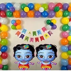 A simple and colorful home decoration for a Krishna-themed birthday, featuring a balloon arch and two large Krishna foil balloons.