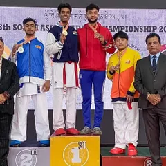 A proud moment for the academy and for India. My students, Tushar and Harshit, on the winners' podium after securing gold medals at the 8th South Asian Karate Championship in Bhutan. We don't just compete; we win.