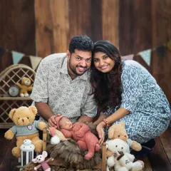 The first family portrait. I believe these moments with you are just as important as the baby’s solo shots, capturing the love that fills the room.