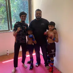 With my senior and junior fighters after a successful training session. I personally oversee the development of fighters at all levels, ensuring a consistent standard of excellence.