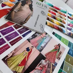 These are the tools that will help you become a designer. Your student handbook, color swatch cards for thread matching, and inspirational images for mood boards are all part of the kit I provide to help you build a strong design foundation.