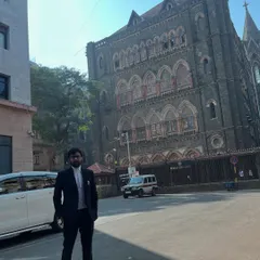 A full view of the magnificent Bombay High Court building. These institutions are the battlegrounds where we fight for justice.