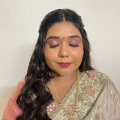 A closer view of the eye makeup and her radiant skin. I work to make sure every detail is perfect, creating a look that is truly a work of art.