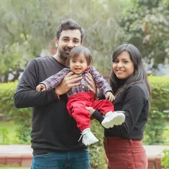 A candid family moment during an outdoor shoot. We encourage play and natural interactions to capture authentic joy and create memories, not just pictures.