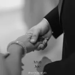 A promise held between hands. This close-up of Amy and Joe's hands, accompanied by a beautiful quote, symbolizes their commitment and the safe place they find in each other.