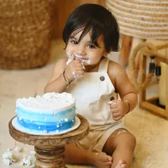 Capturing the sweet and messy details of a cake smash session. This baby boy is fully enjoying his first taste of birthday cake.