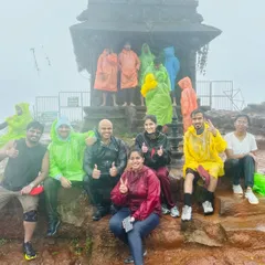 Our group enjoying the monsoon rains at the top of Kodachadri peak. Trekking in the rain is a special experience in the Western Ghats.