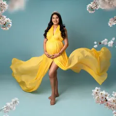 What a ray of sunshine! This bright yellow gown flows so beautifully and looks amazing against the soft blue studio backdrop. I added a delicate floral frame to give this portrait a dreamy, ethereal quality.
