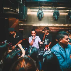 The DJ booth is the command center. Here I am with the crew, hyping up the crowd and making sure the vibe is just right for a memorable night.