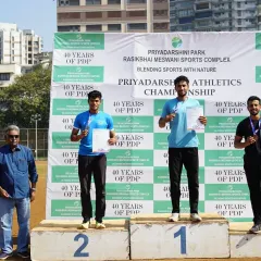 A proud moment for our champions. Athletes stand on the winner's podium during the prize distribution ceremony of the PDP Athletics Championships, celebrating their hard-earned victories.