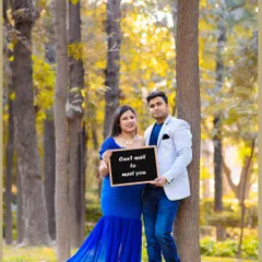 Let's have some fun with props! A simple chalkboard with a sweet message adds a personal and playful touch to your couple portraits, telling the story of your excitement.