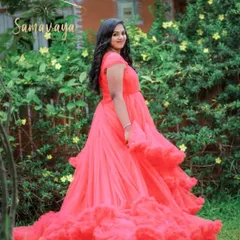 A closer look at our beautiful red gown, perfect for making a bold and joyful statement in your photos.