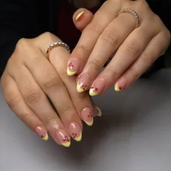 This set just says "freshly picked." The bright yellow French tips are accented with tiny, hand-painted cherries for a fun and summery vibe.