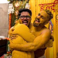 A big, happy hug covered in turmeric. We focus on capturing the bonds between the groom and his friends during this joyful ritual.