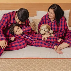 A quiet cuddle moment during the same pajama session, this time including the family's furry member. We believe pets are family too and always welcome them in photoshoots.