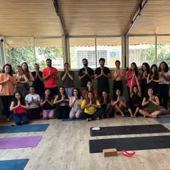 Gratitude for our growing tribe. A beautiful moment captured with our community after a fulfilling group yoga session, all centered and connected.
