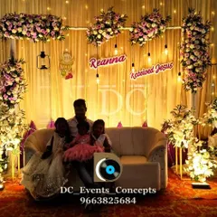 A heartwarming moment from a First Holy Communion celebration we decorated. The stage, with its warm lighting and floral arrangements, provides a beautiful setting for family photos.