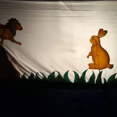 This is a glimpse into the ancient art of Chitrakathi, a 400-year-old form of shadow puppetry. The stark contrast of the handcrafted leather puppets against the screen creates a mesmerizing storytelling experience, bringing tales like the Panchatantra to life for a new generation.