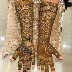 This design combines floral elements with classic Indian patterns like checks and swirls, creating a full and festive look.