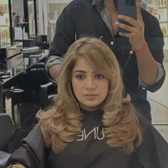 Face-framing layers and a beautiful blonde color are a perfect match. This look lifts her features and adds so much brightness.