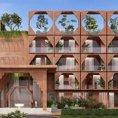 A frontal view of the Tirupati retreat, showcasing the rhythmic pattern of the arches and balconies. The design is rooted in Vastu and nurtured by Ayurveda, offering a sense of calm and purity.