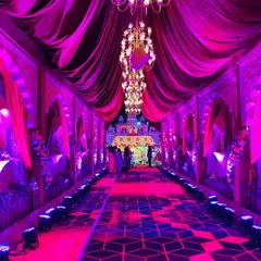 We believe in grand entrances. This royal Rajasthani-inspired passage, with its intricate architecture and dramatic lighting, sets the tone for a truly unforgettable, big-fat-Indian-wedding.