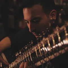 A close-up of my hands on the sitar during a recording session for the 'Mastery' series on Disney+ Hotstar. This shows the intricate musicianship that forms the foundation of my productions.
