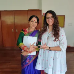 Sharing a moment with Angelica, the coordinator from the Embassy of Colombia, during our fusion workshop. Here, we are demonstrating the 'mudra' or hand gestures of Bharatanatyam.